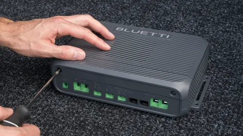 Unscrew and remove the cover from Charger 2