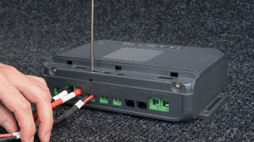 Connect cables to CHG ports